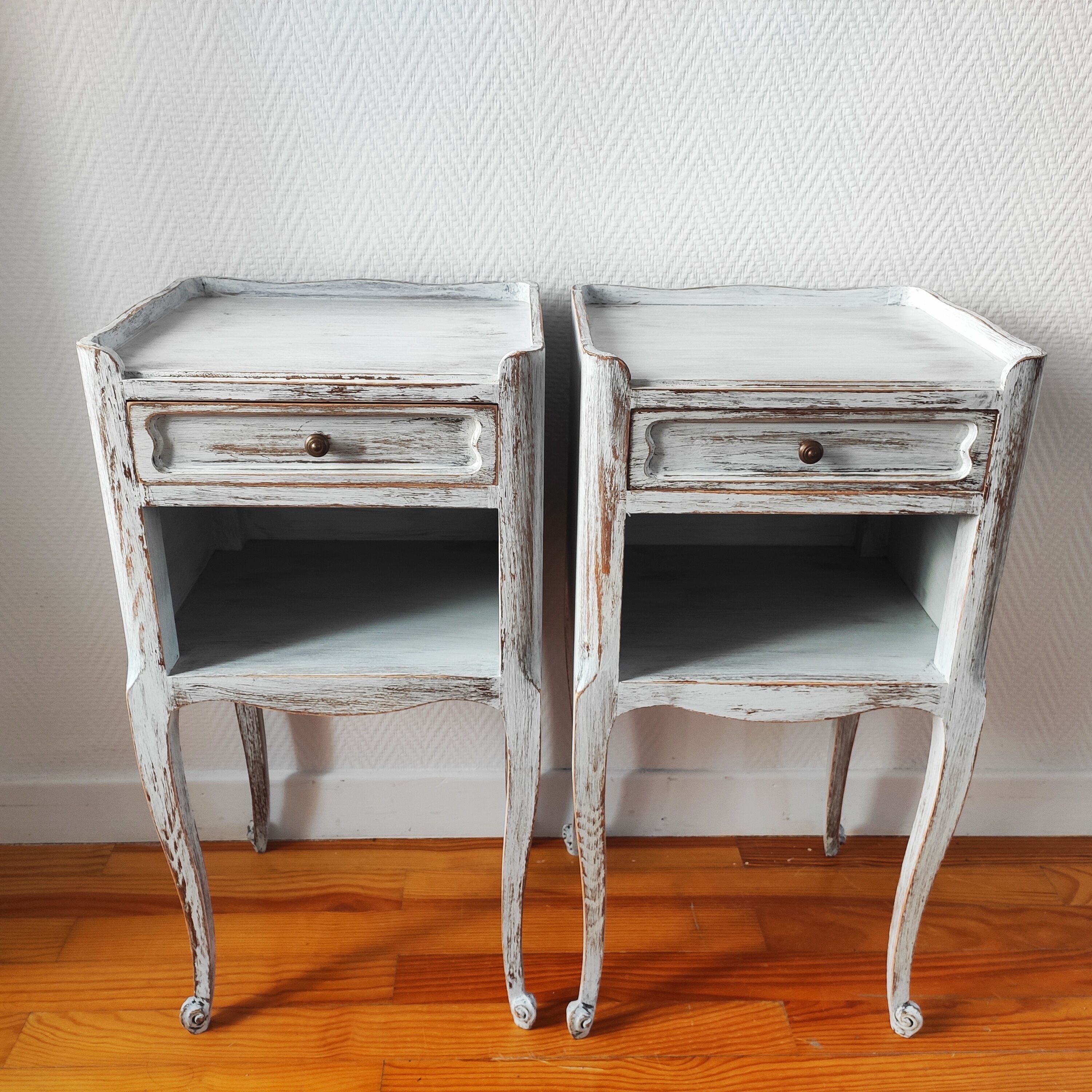 Pair of patinated bedside tables