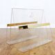 Plexiglas and brass magazine holder