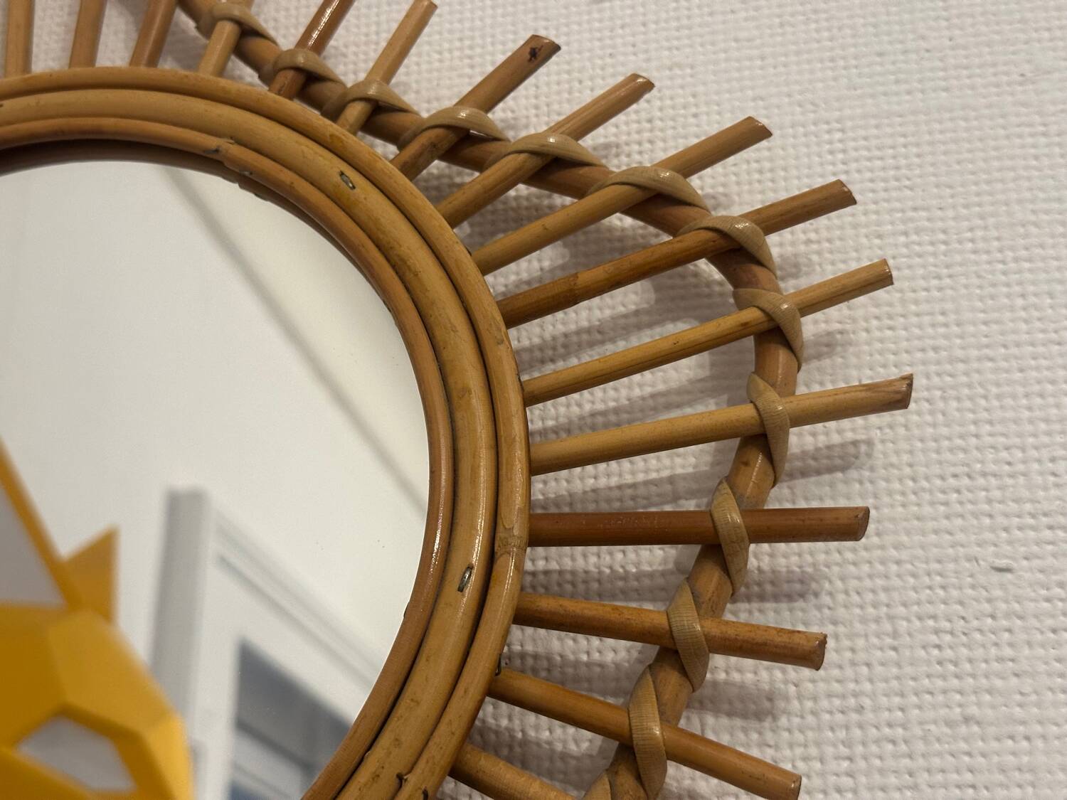 The vintage guitar rattan mirror.