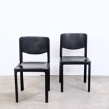 Pair of Matteo Grassi chairs in black saddle leather, 1980s.