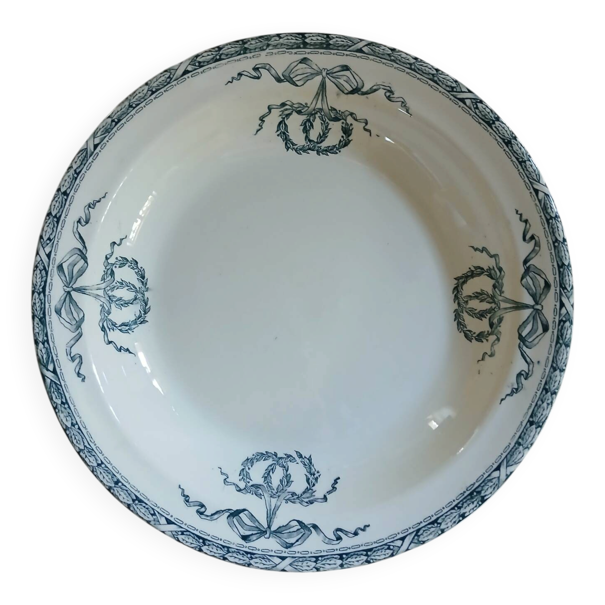 Old hollow dish made of Salins ironstone.