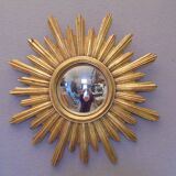 Sun mirror in golden resin from the 70s