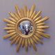 Sun mirror in golden resin from the 70s