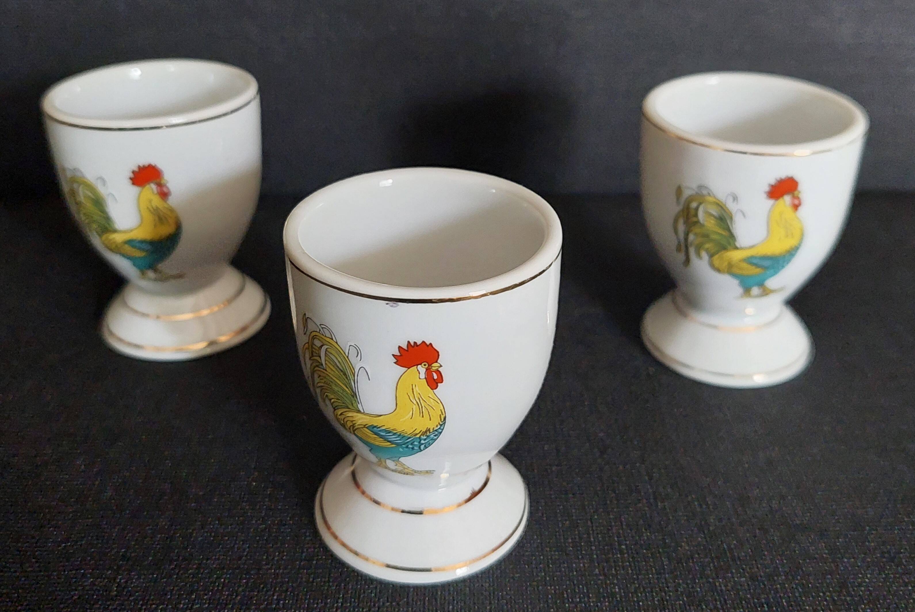 Porcelain egg cups with rooster decoration, set of three