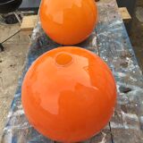 Two orange opaline globes, 30 cm diameter