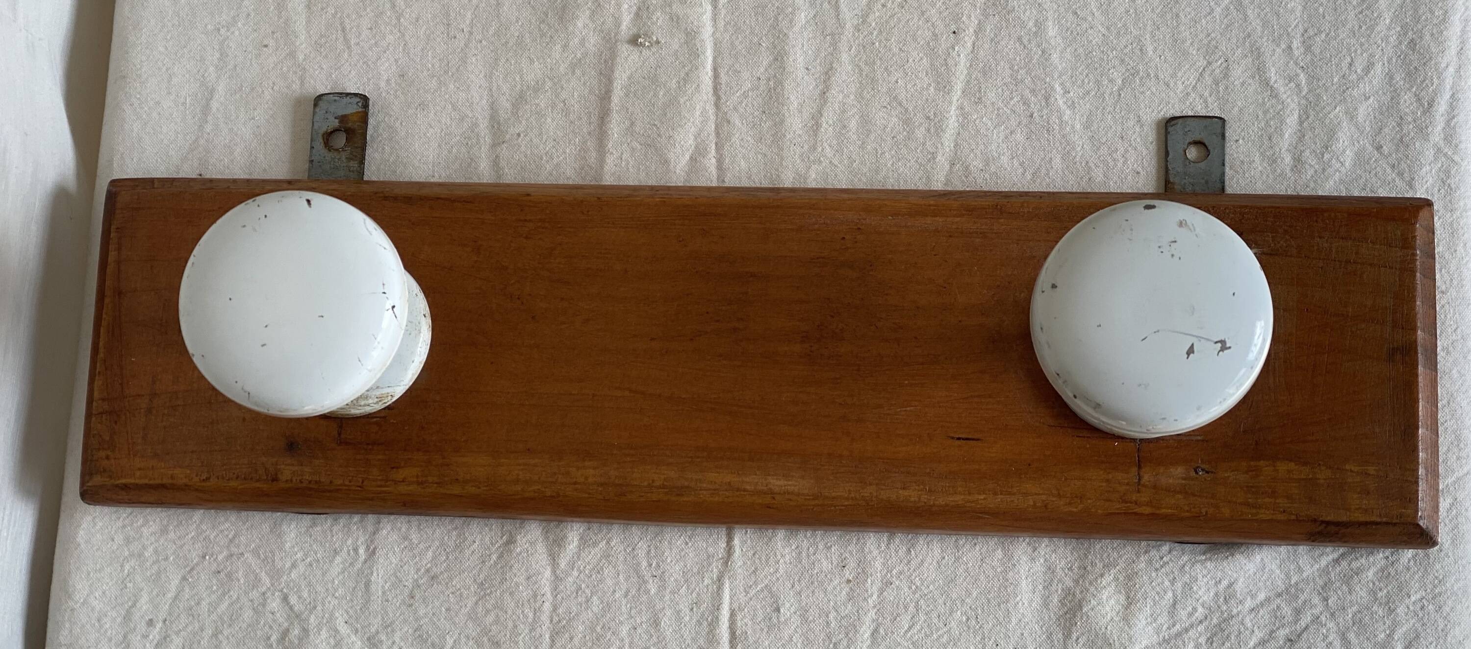 Wall-mounted coat rack with 2 hooks, vintage 1960s white lacquered metal.