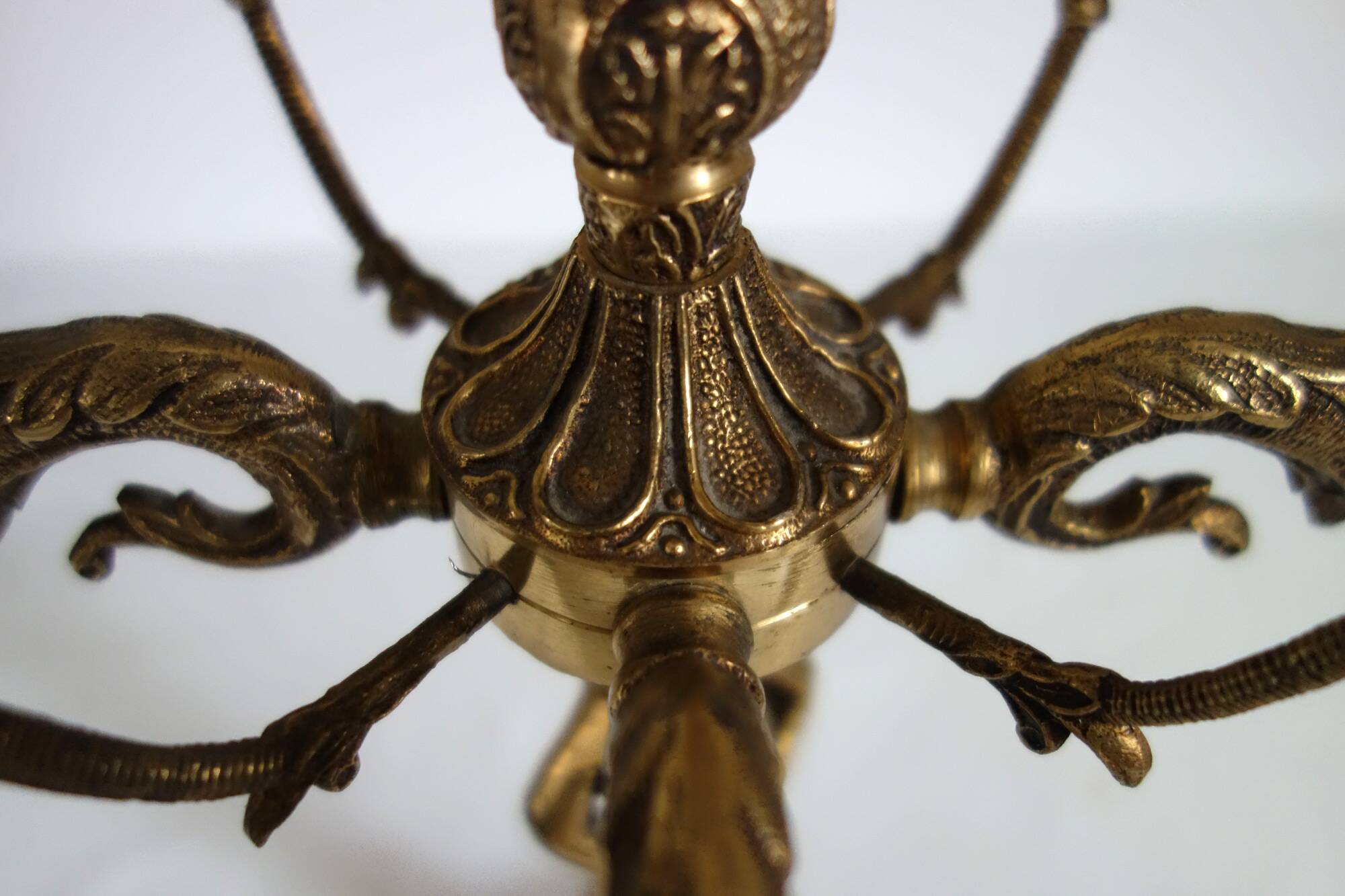 Pair of cherub candle holders in gilded bronze, early 20th century.