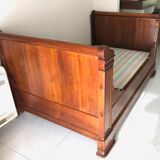 Cherry wood boat bed with bedding