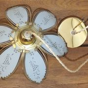 Glass flower rimmed with brass