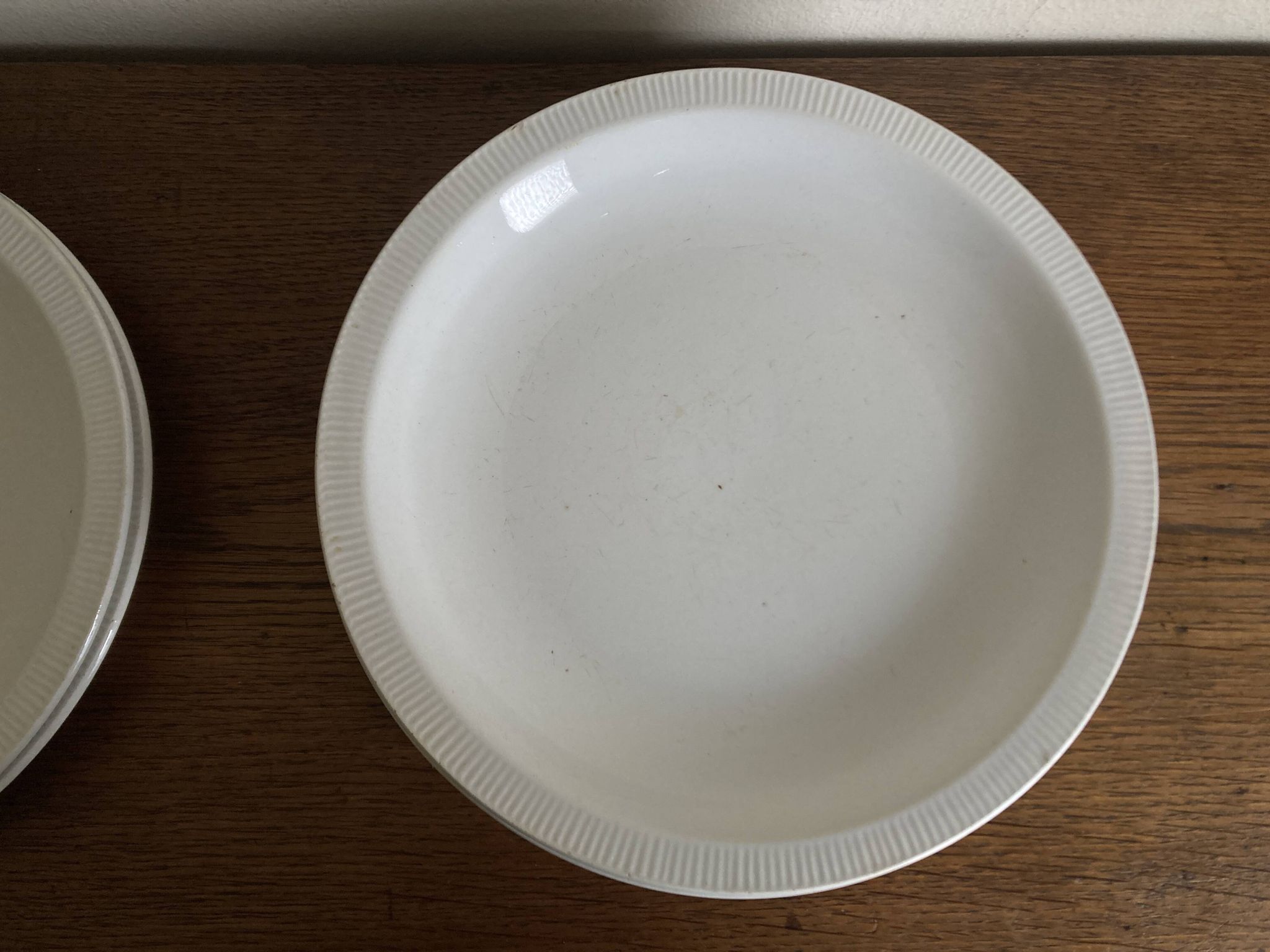 Set of 7 modernist flat plates Lunéville 1930 white earthenware