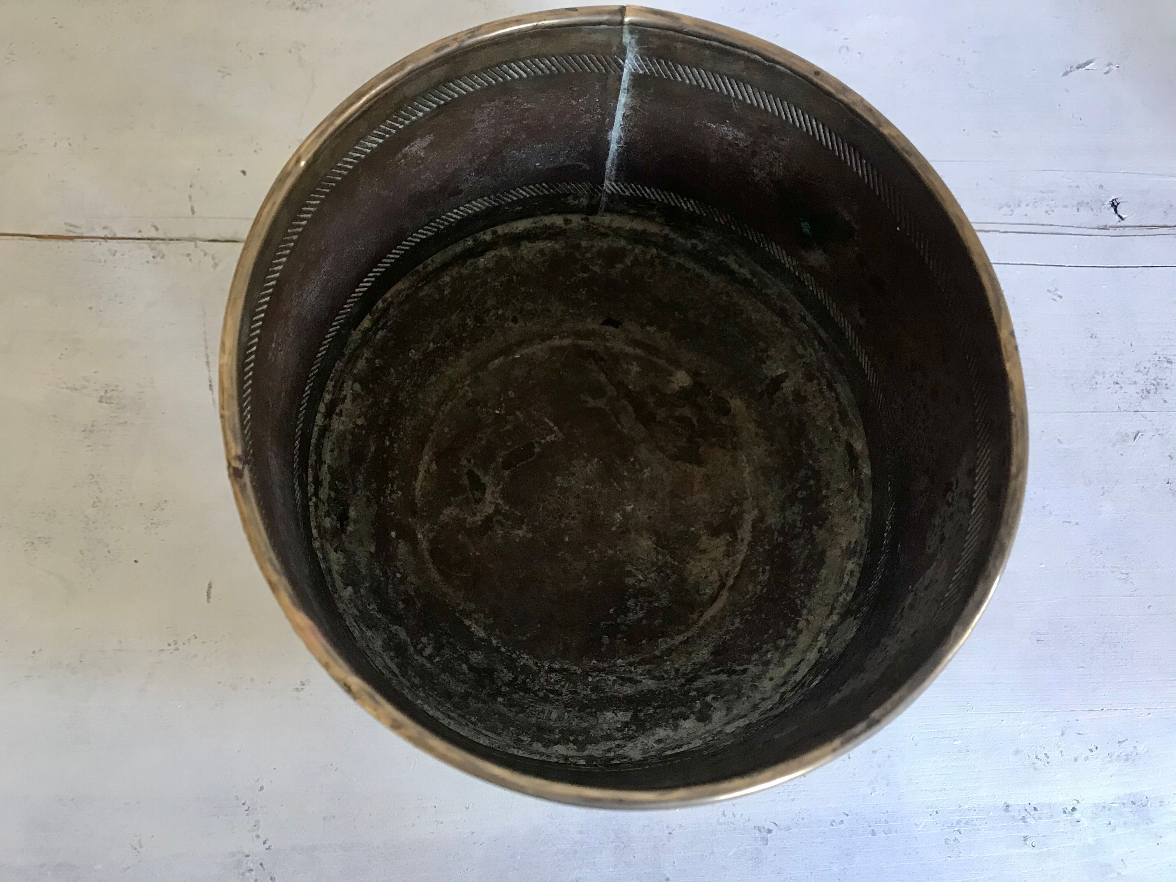 Former brass tripod pot