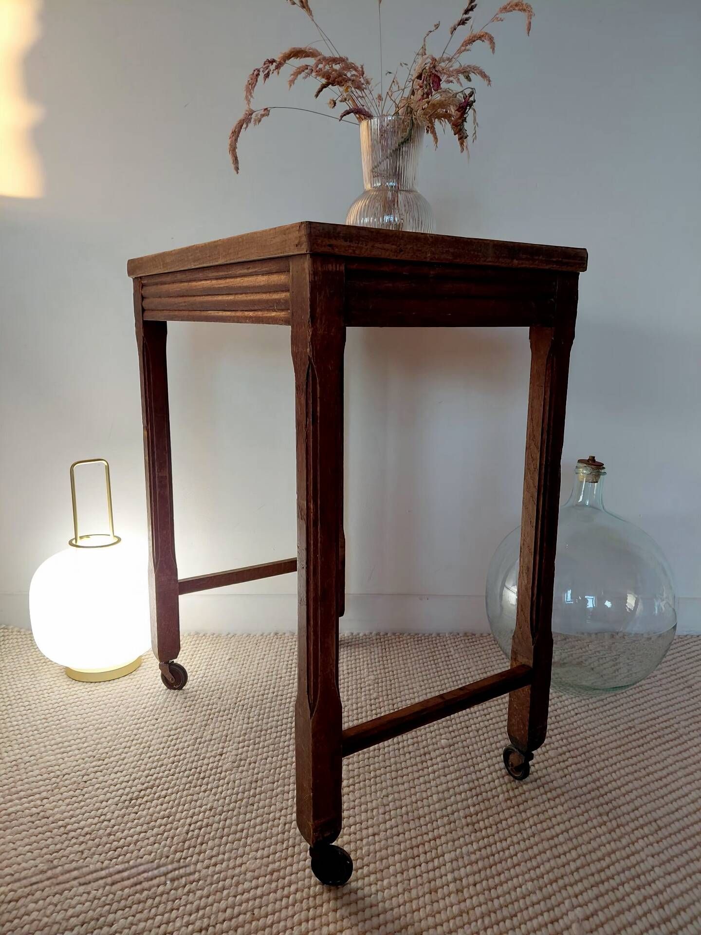 Vintage wooden wheeled side table/console.