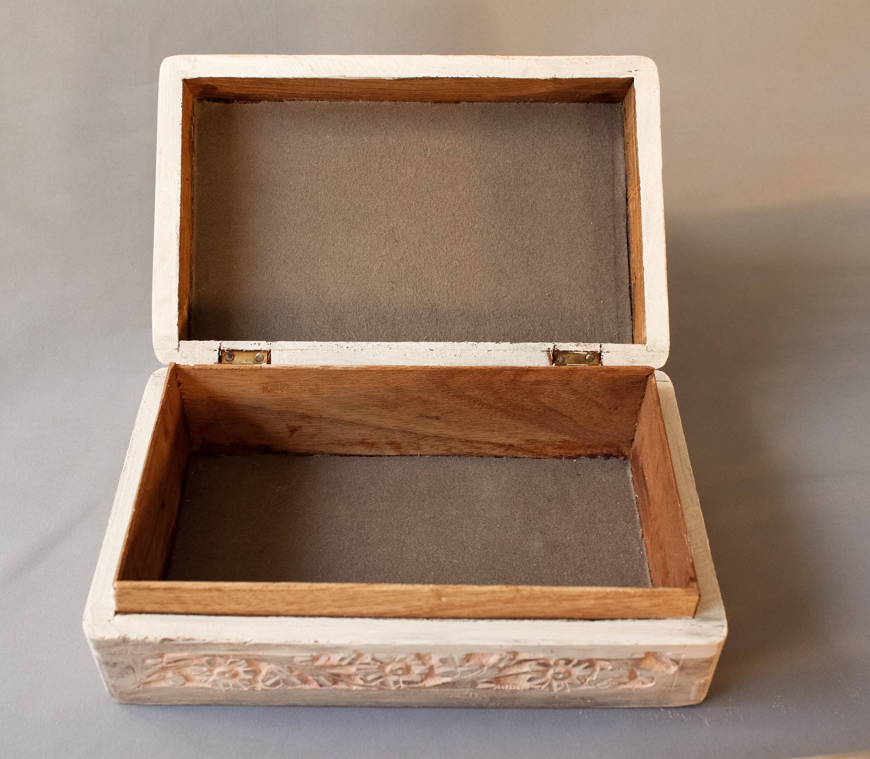 Hand-carved wooden boxes with ivory inlays