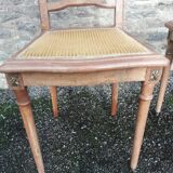 Pair of old chairs with brass elements