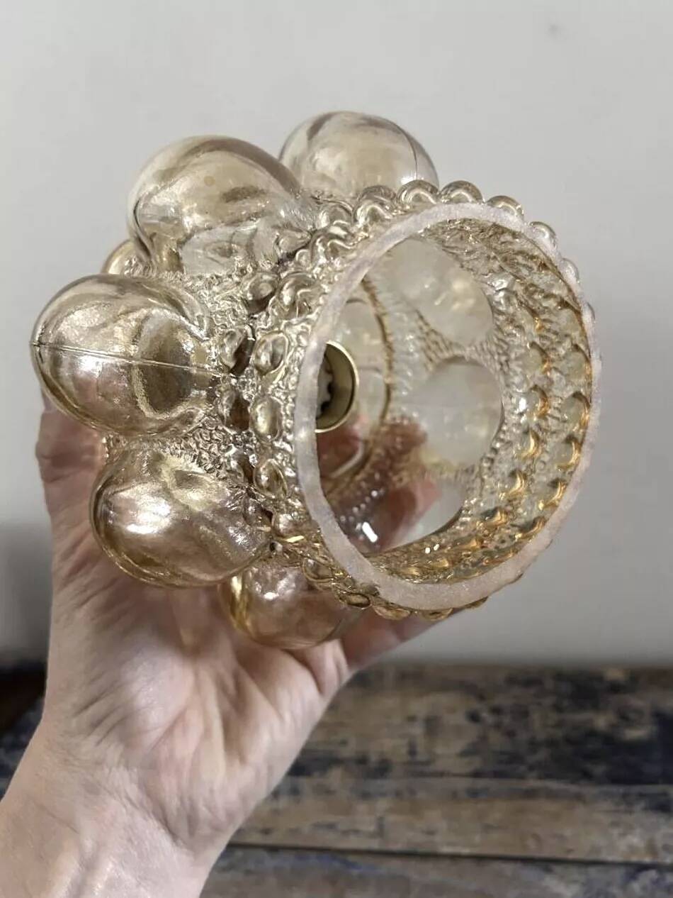 Gold tilting wall light