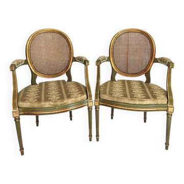Pair of Louis XVI style armchairs, oval backrest and caning.