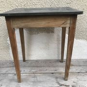 Old kitchen table in wood with compass feet