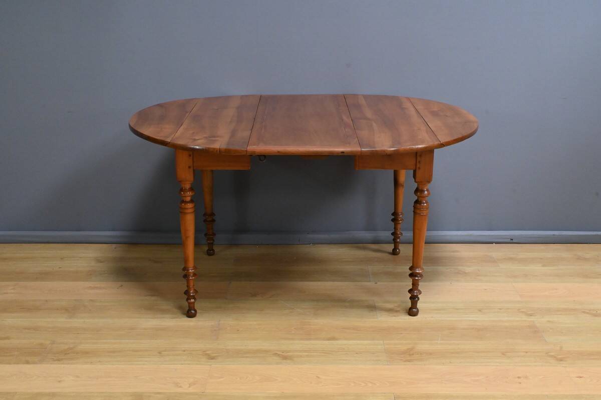 Table for 4 to 10 people with cherry wood extensions, Louis Philippe style – Late 11th century