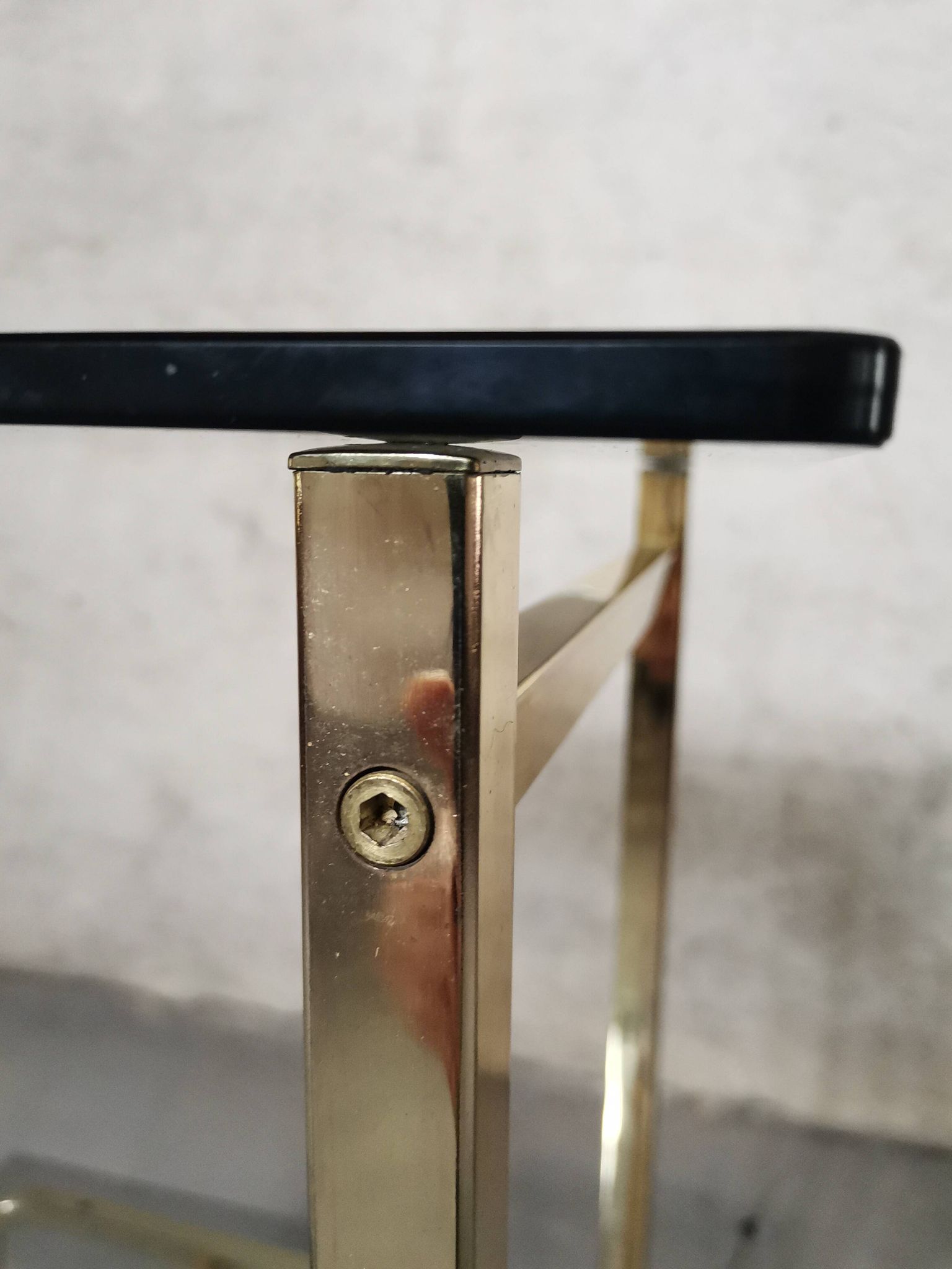 Side Table 1970s smoked glass/gold/wheels