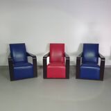 4 x Vintage Ying lounge chairs / fauteuils van Hugues Chevalier,'90. 3 x blue / 1 x red leather