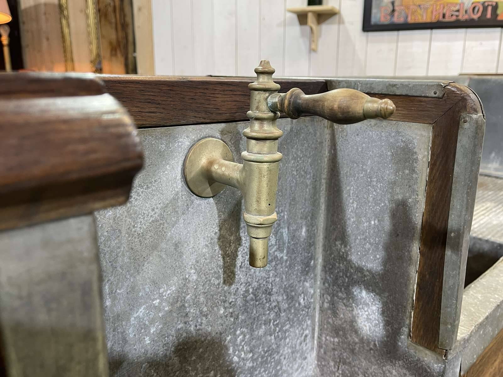 Comptoir de bar en chêne début XXème avec habillage d'époque zinc et étain