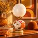Cassandre — Table lamp in white opal, floral ceramic and brass