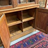 Meuble vitrine de magasin ancien en chêne
