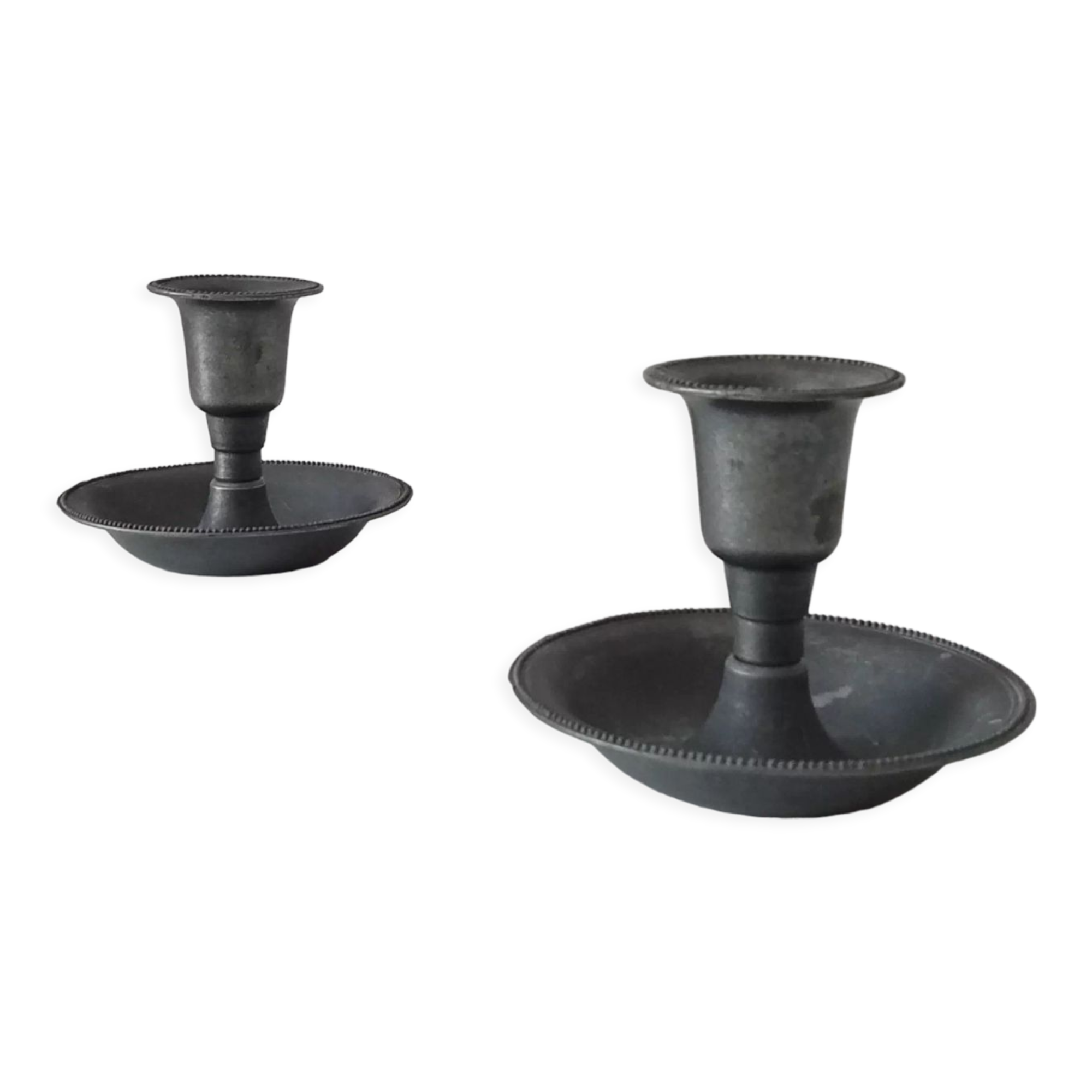 Pair of antique pewter candle holders