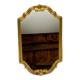 Hexagonal mirror in gilded wood
