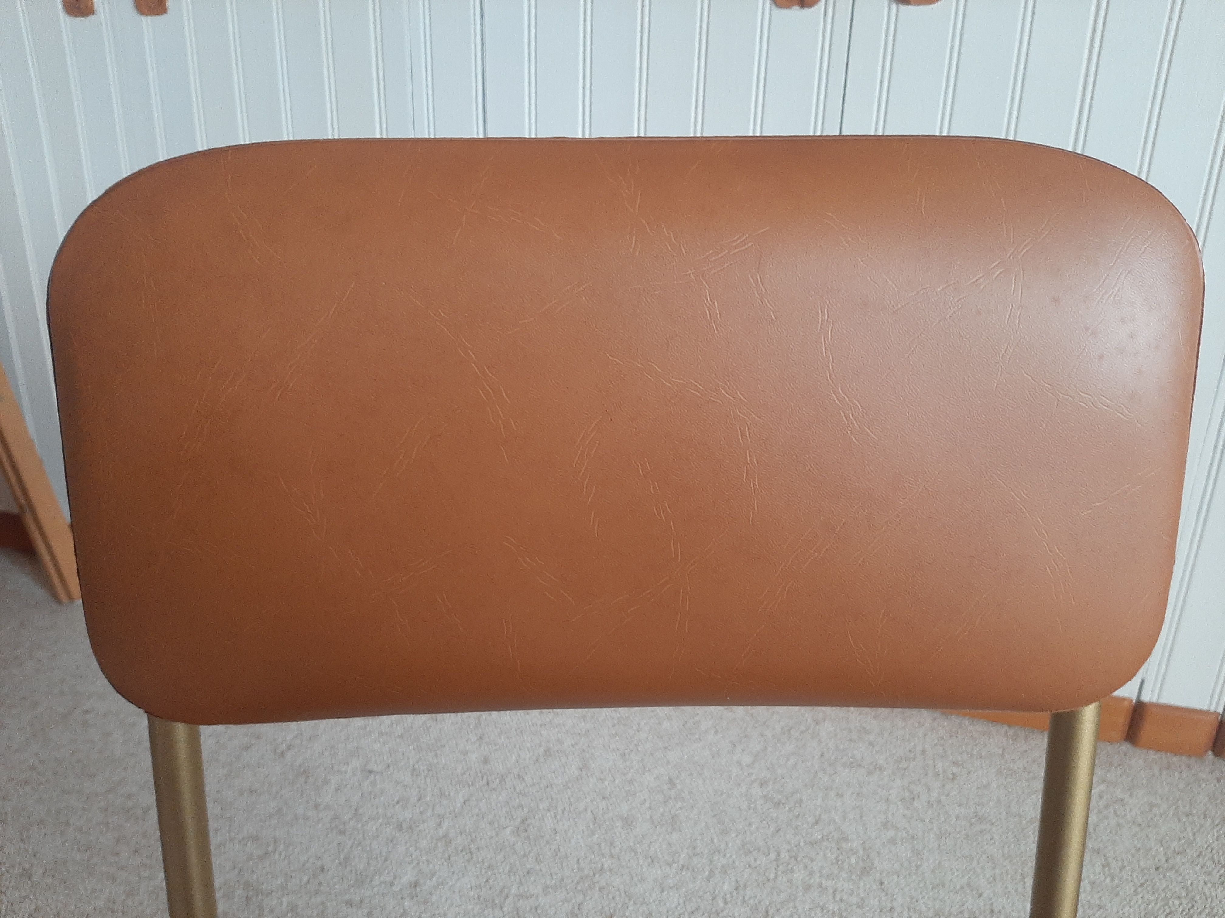 Chaise pliante structure tube et simili cuir