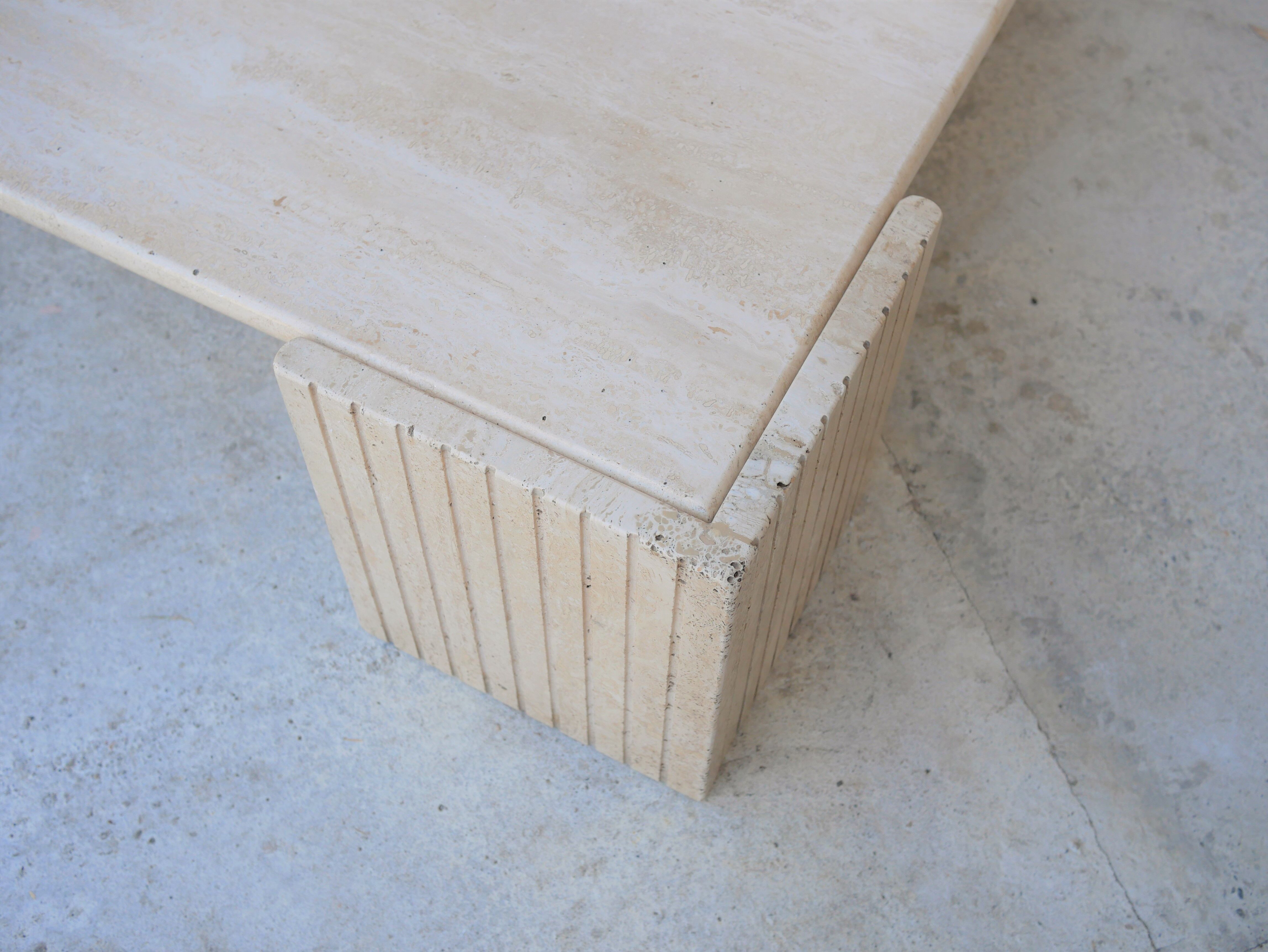 Coffee table in travertine by Roche Bobois editions