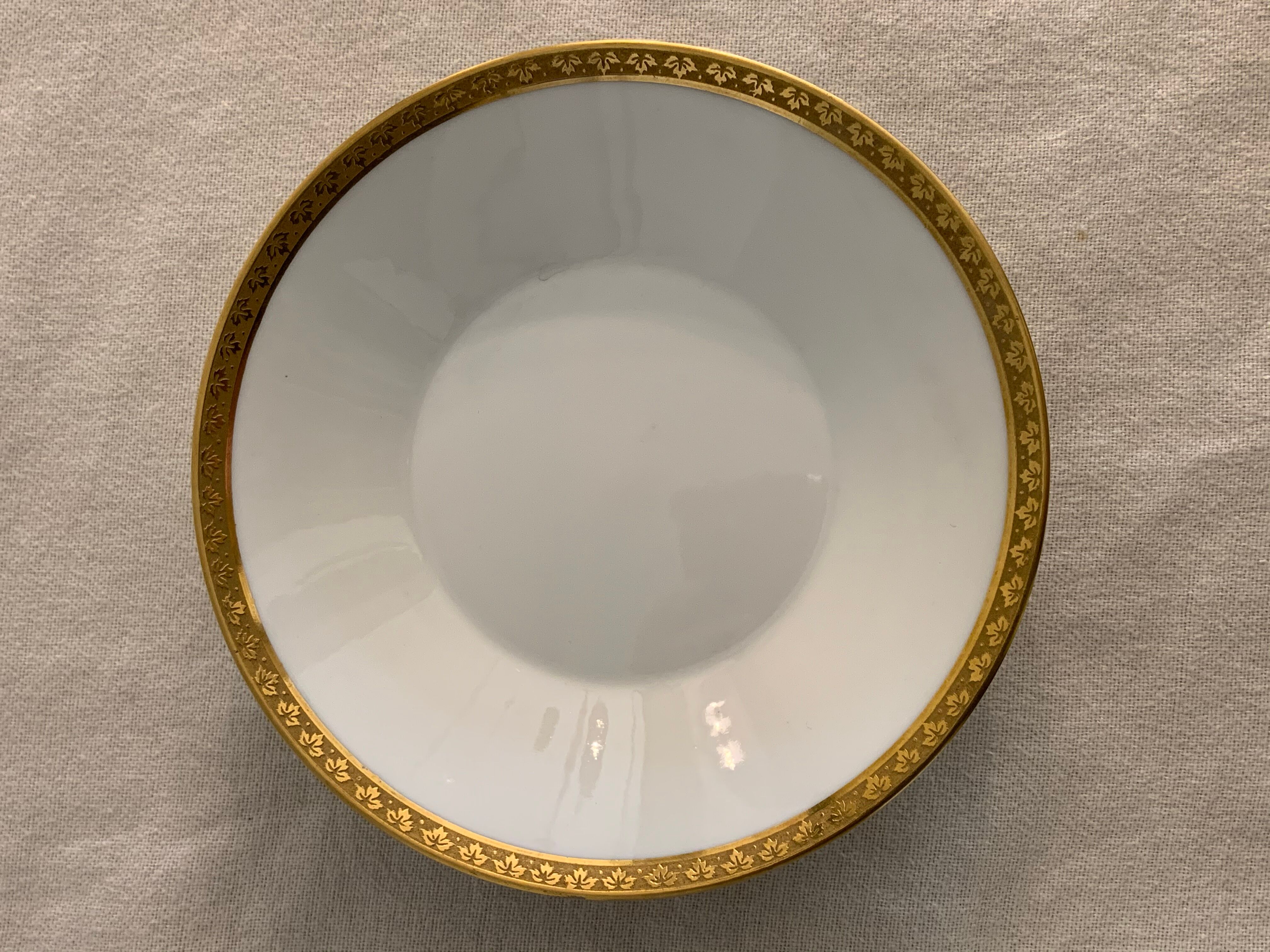 12 coffee cups and 12 white porcelain cups of Gold Gold Limoges