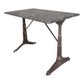 Bistro table with a marble top on a cast iron frame, 1930s.