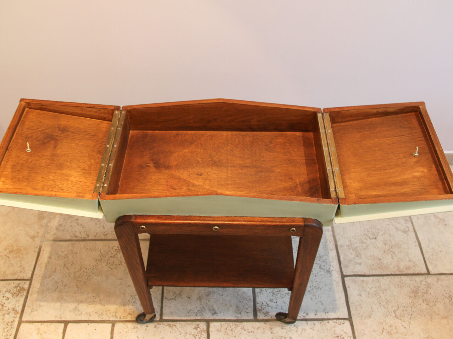 Worker green wood feet wheels