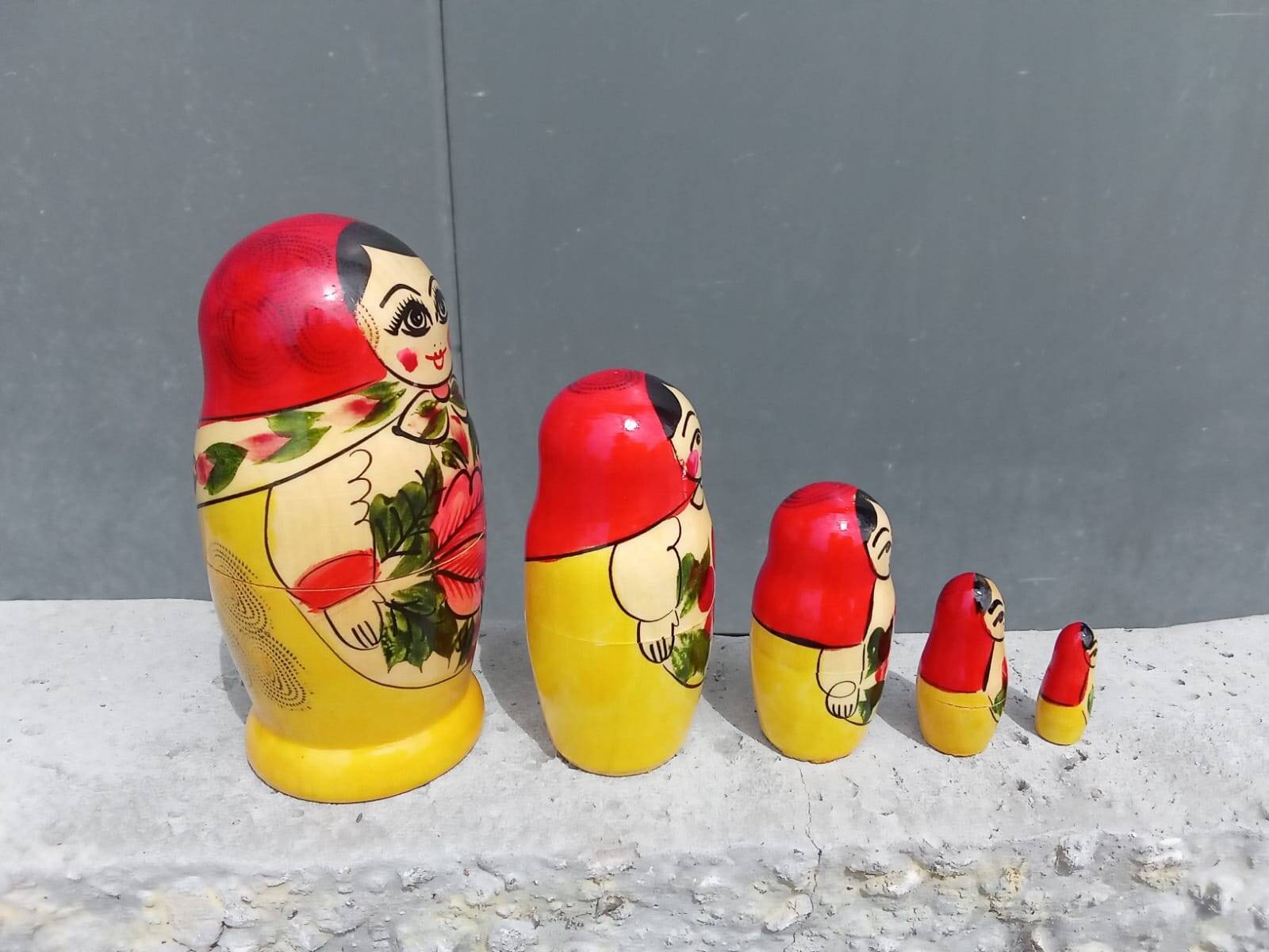 Decorative Russian Matryoshka dolls made of hand-painted wood.