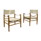 Pair of safari armchairs canvas and leather stretched