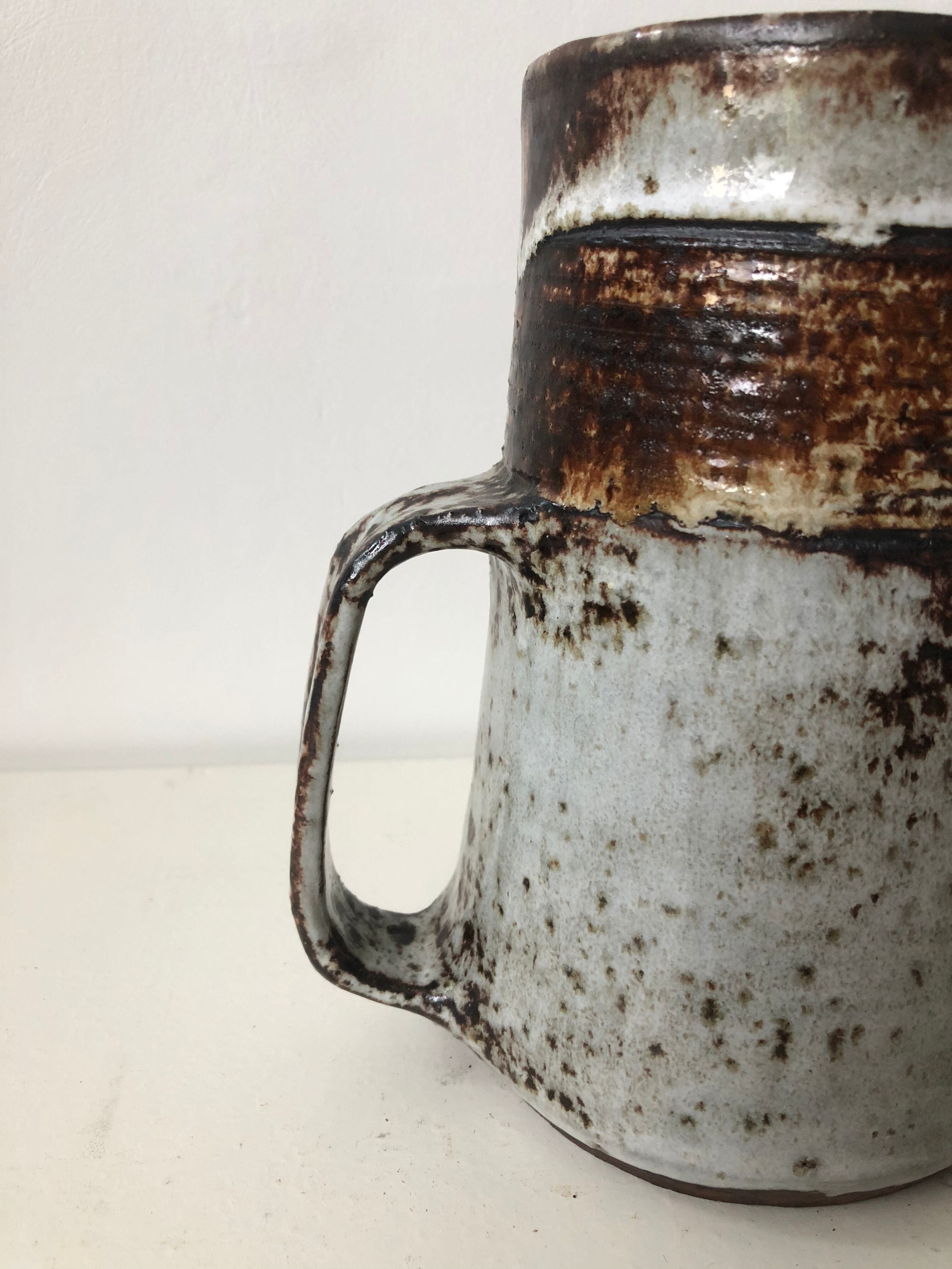 Brown grey enamelled stoneware pitcher