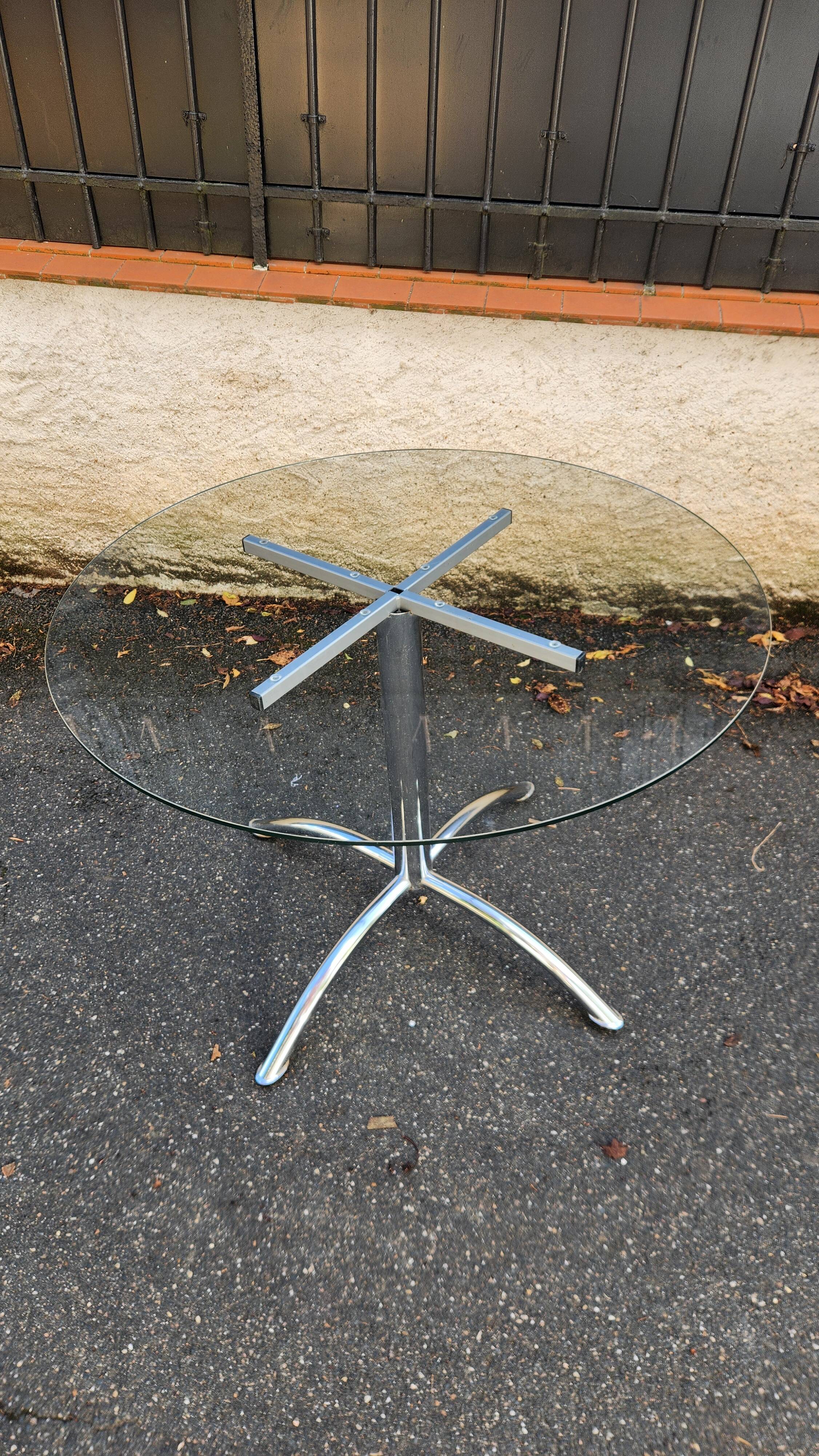 Chrome table with glass dining top from the 1980s.