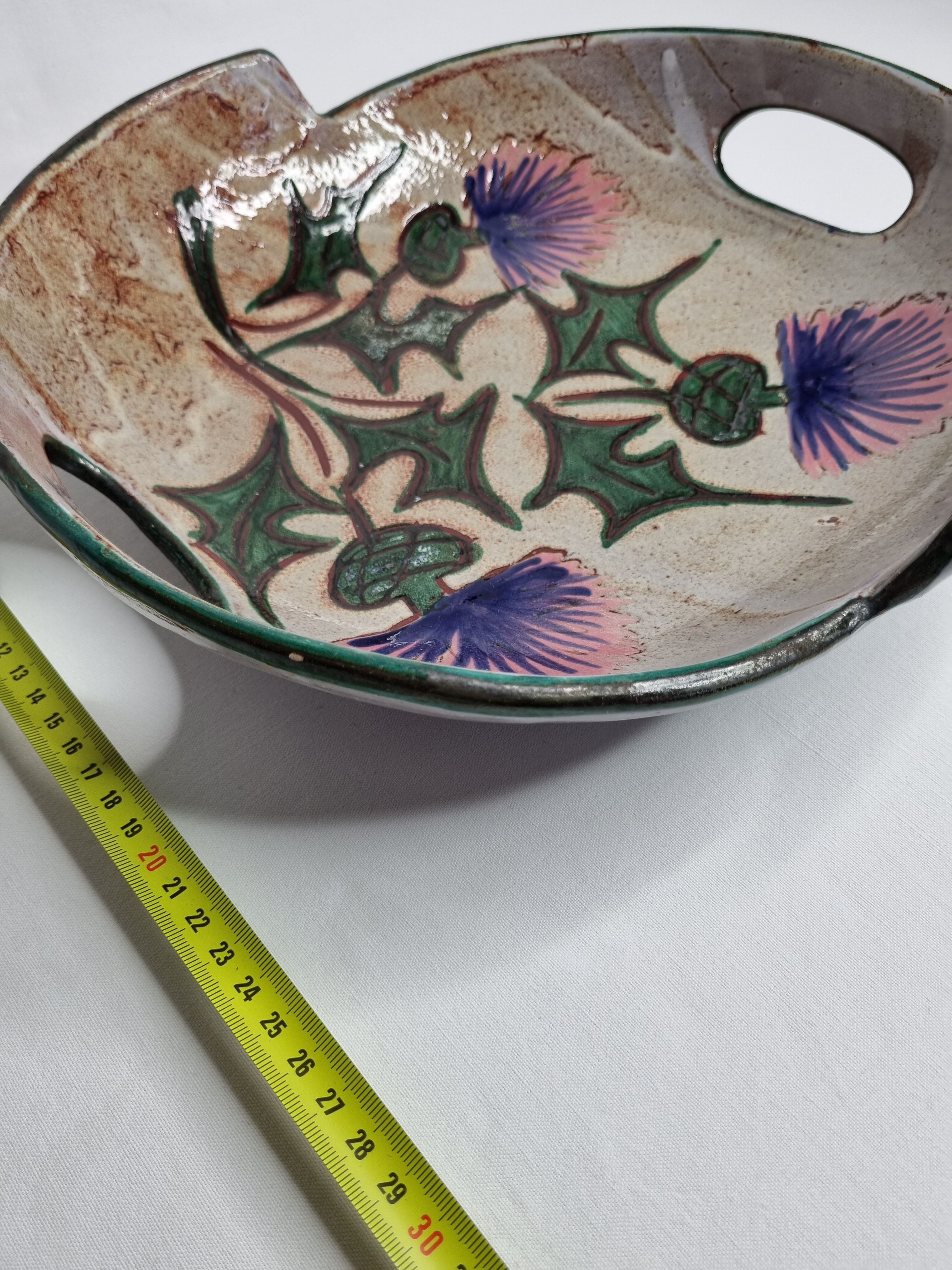 Ceramic dish with thistle decoration by Daniel Etienne, 31 cm