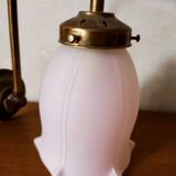 Brass wall lamp with pale pink bell