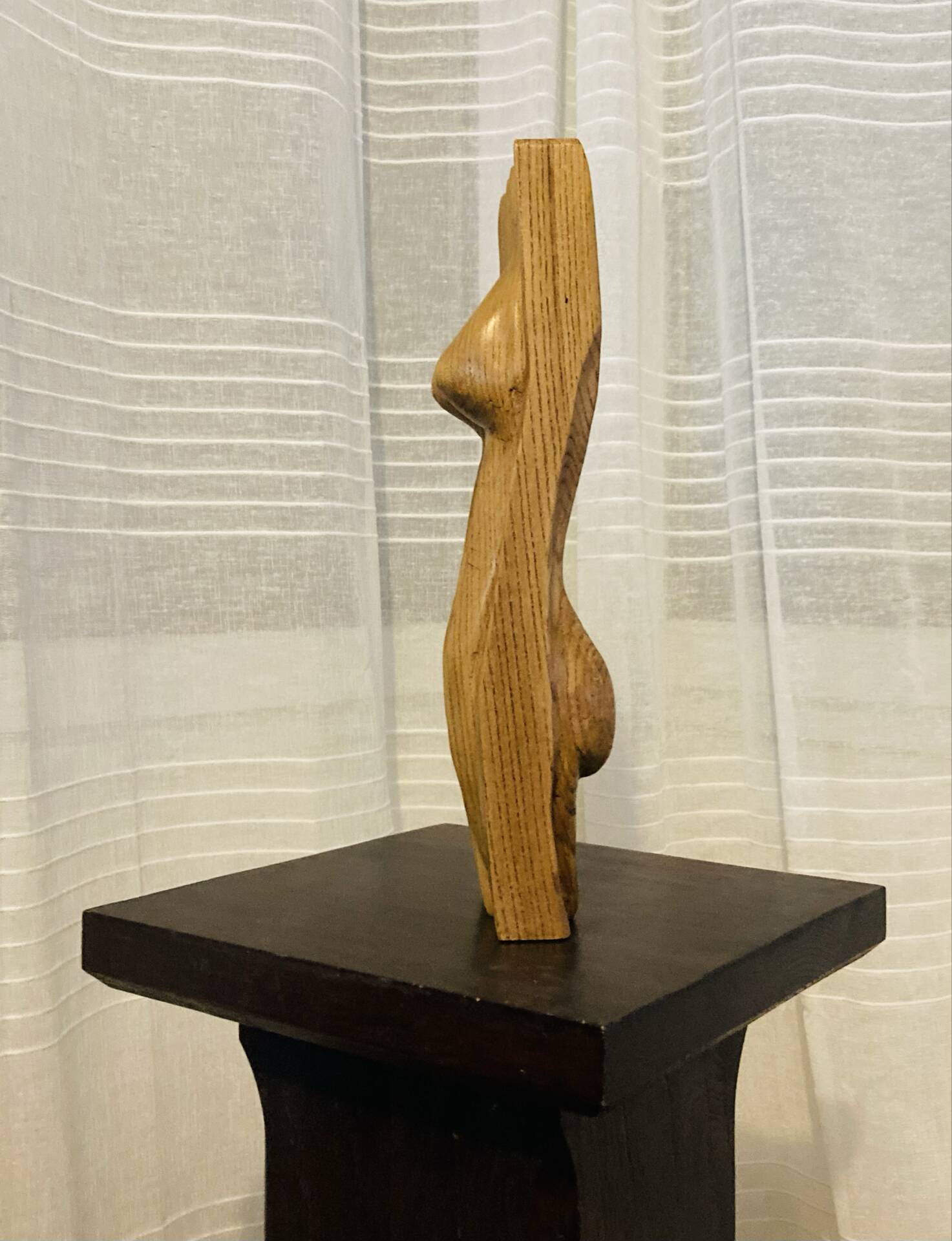 Stylised vintage female sculpture from the 1960s with organic shapes.