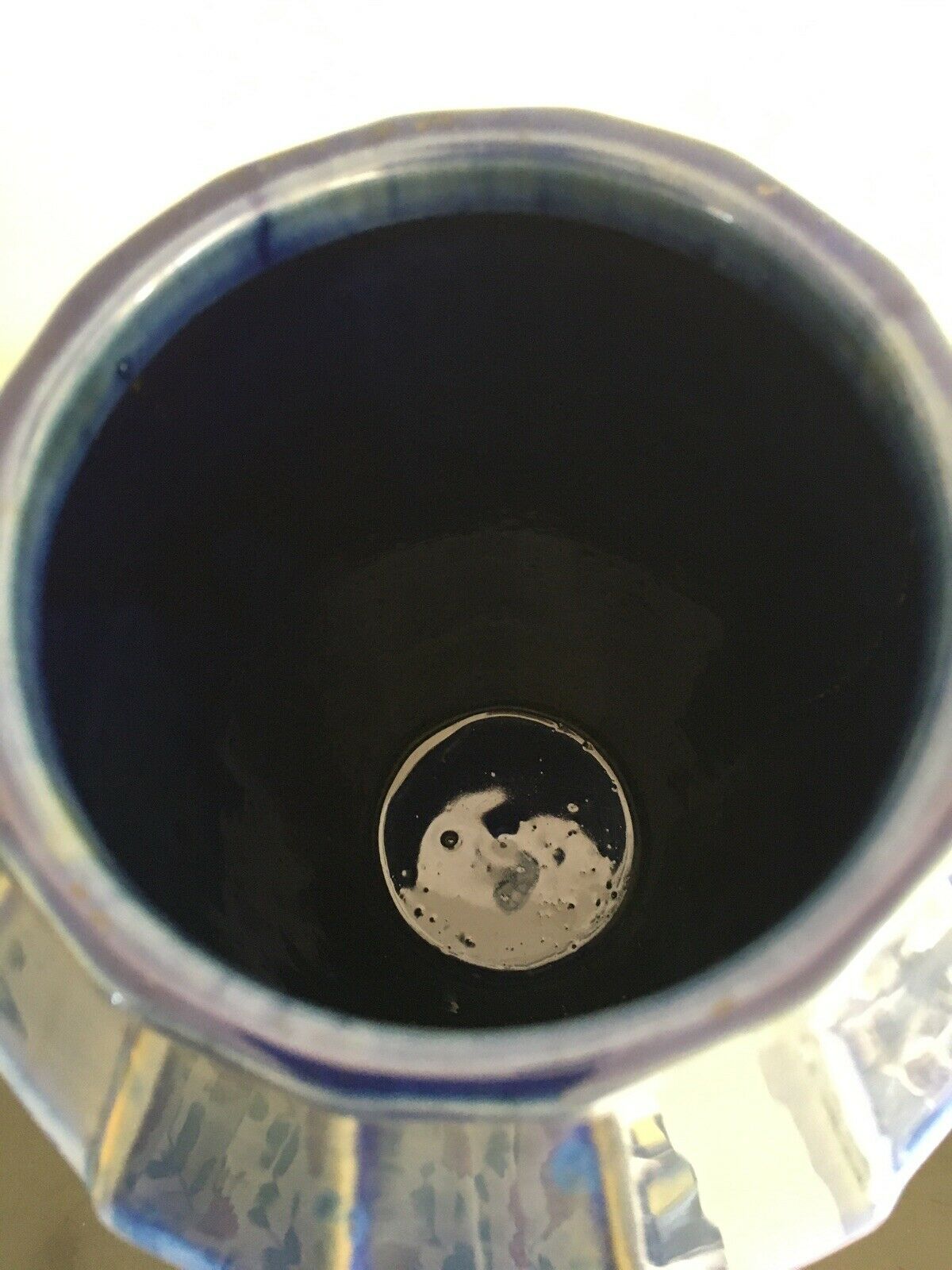 Old blue enamelled ceramic vase