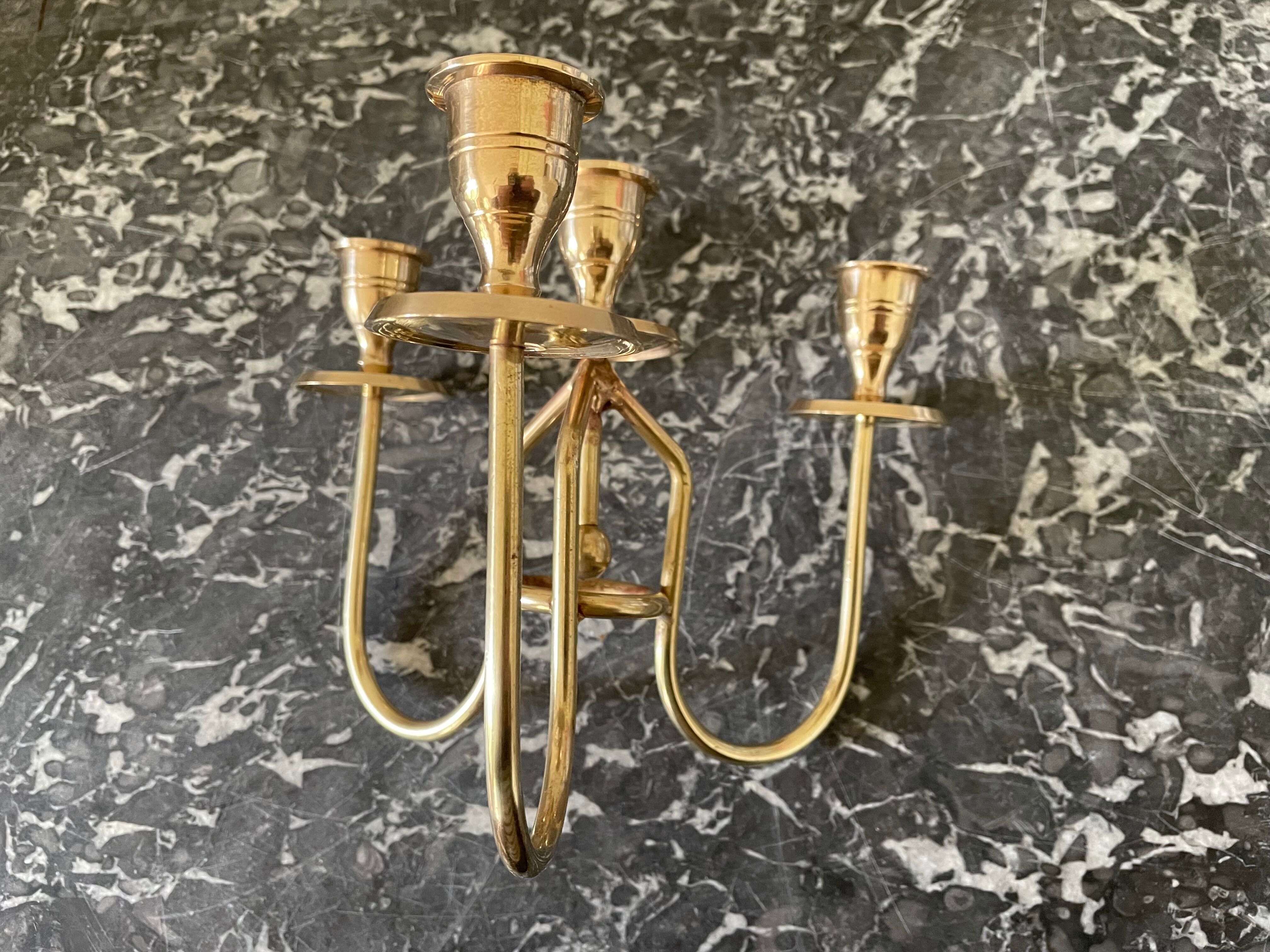 Golden brass candle holder