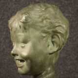 Sculpture in bronze painted terracotta bust of a child