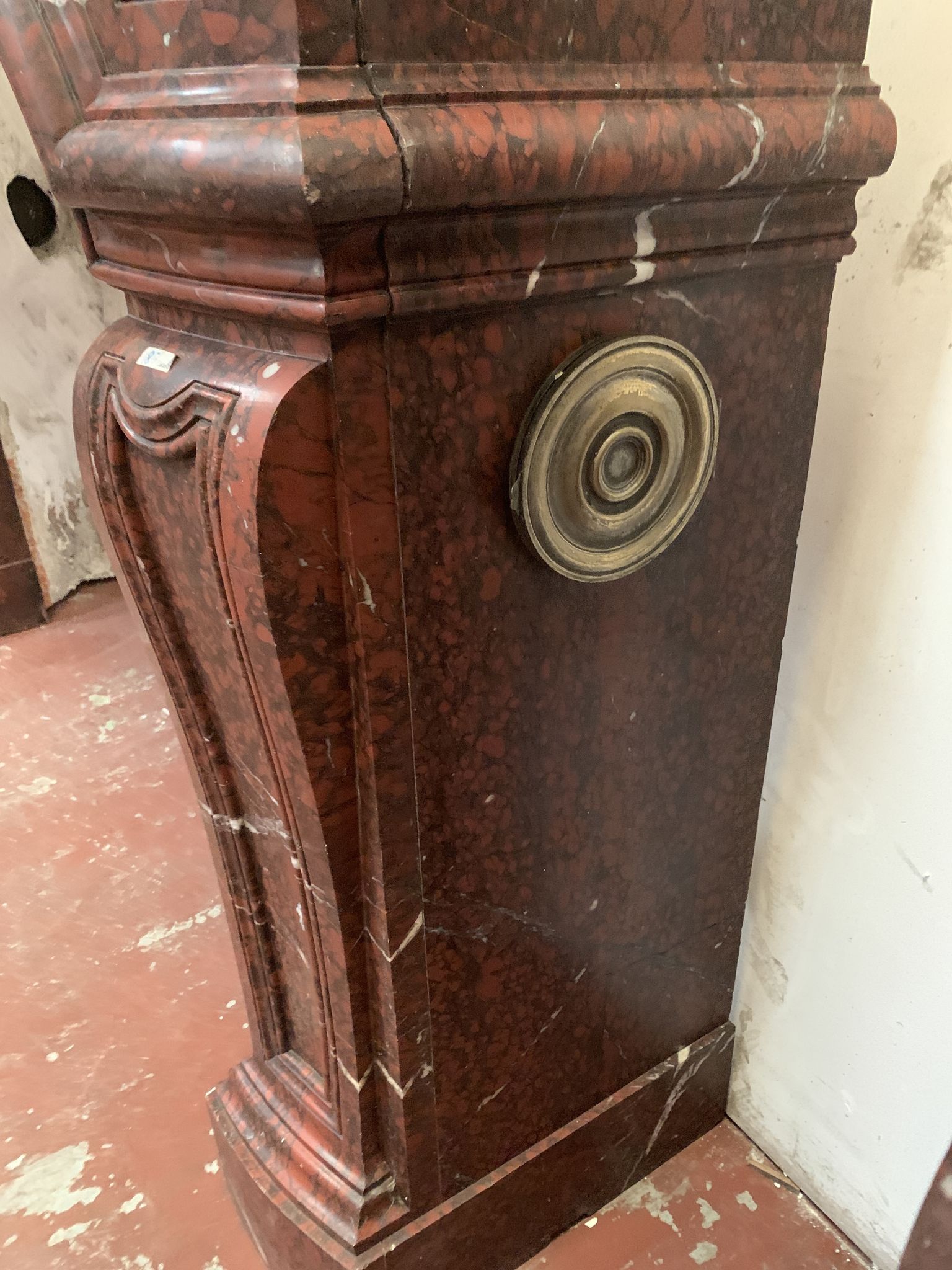 Pair of Louis XIV style fireplaces in red cherry marble. XIX century.