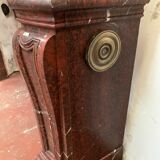 Pair of Louis XIV style fireplaces in red cherry marble. XIX century.