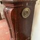 Pair of Louis XIV style fireplaces in red cherry marble. XIX century.