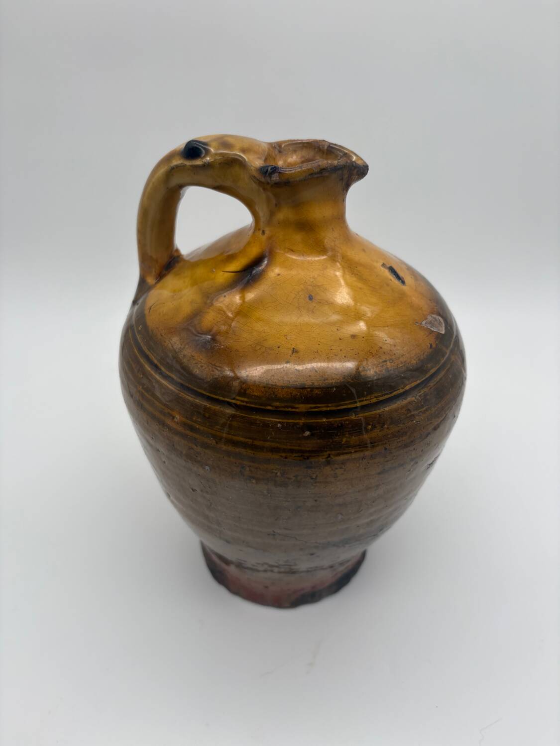 Yellow glazed terracotta pitcher, Spain, 19th century