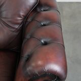 Red 2.5-seater Chesterfield sofa on wheels in English style