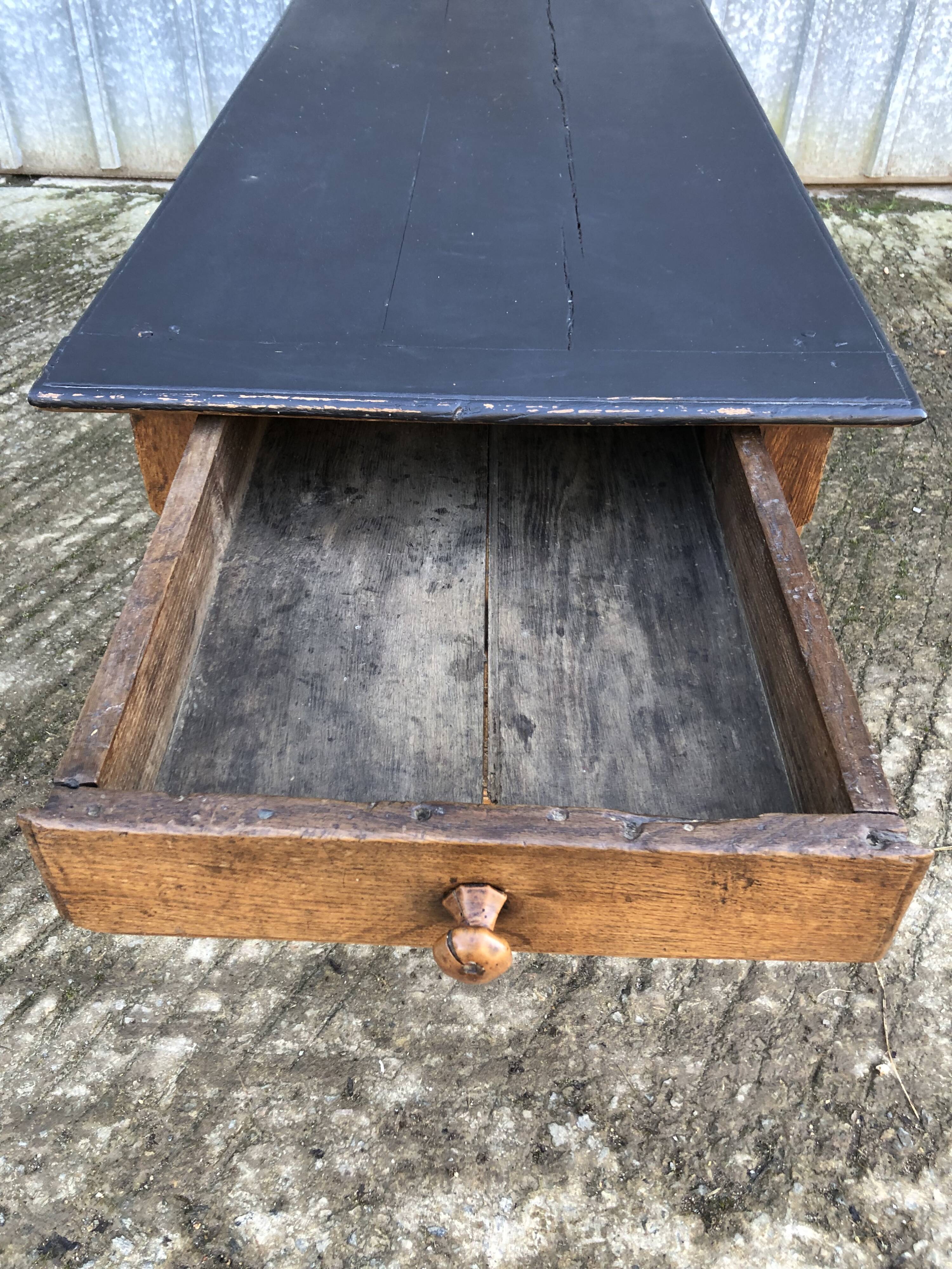 Antique oak farmhouse table with cat bar and 2 end drawers